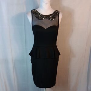 Elegant Black Peplum Dress with Illusion Sequined Neckline